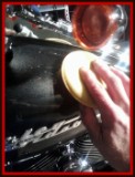 Applying wax with applicator pad by Fifty Dollar Detail.