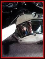Blow drying motorcycle chrome by Fifty Dollar Detail.