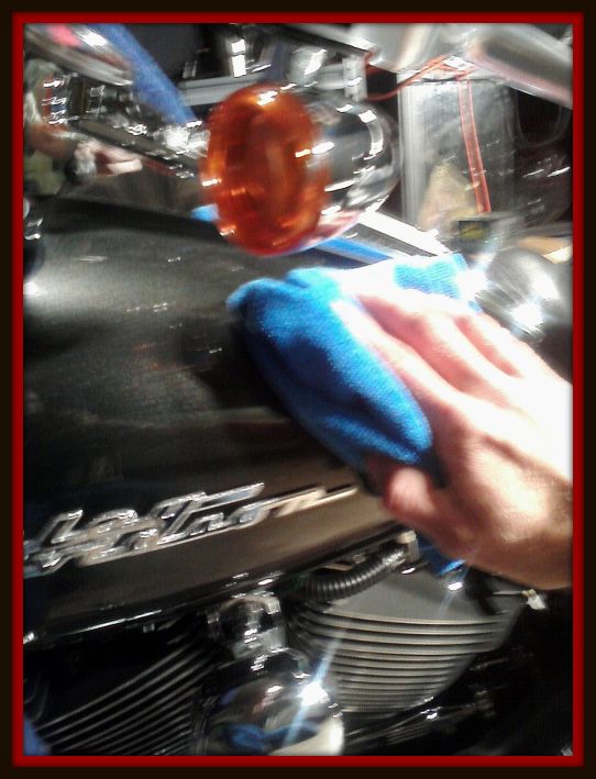 Removing wax with a microfiber towel by Fifty Dollar Detail.
